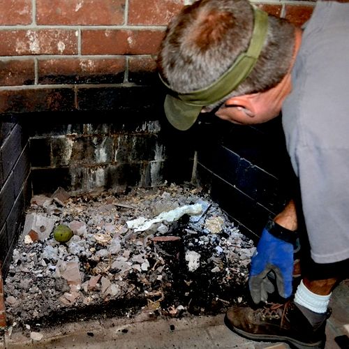 John doing a fireplace inspection.