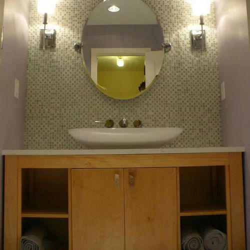 custom vanity with custom glass wall tile