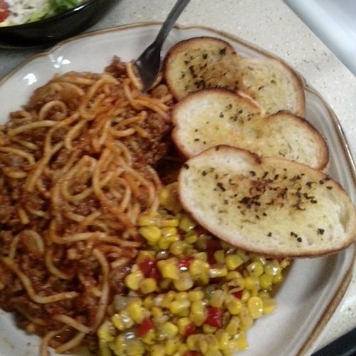 spaghetti meal with spaghetti,grill corn,homemade 