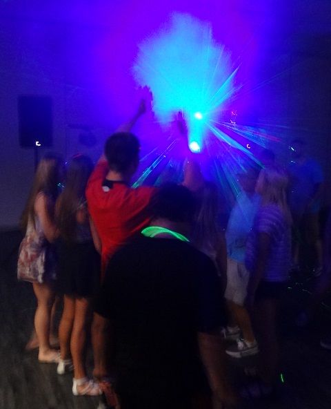 Action on the dancefloor at a teen birthday party 
