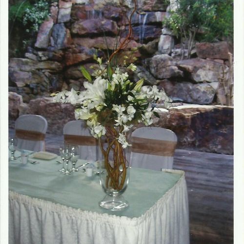 Curly willow and Oriental Lilly centerpiece