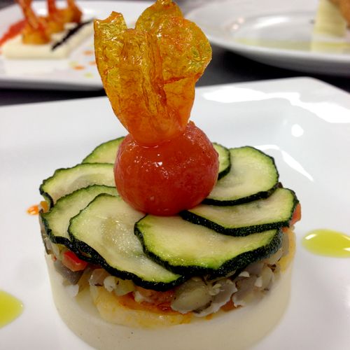 Mashed Potato topped with Lamb and confit cucumber