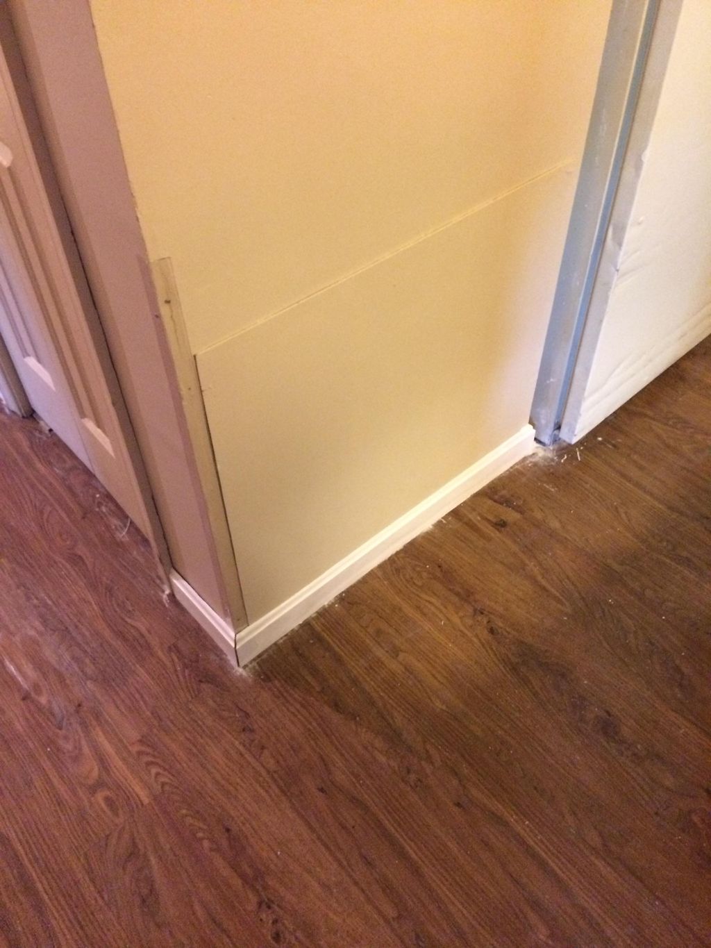 (After) With protective corner pieces and wall cov