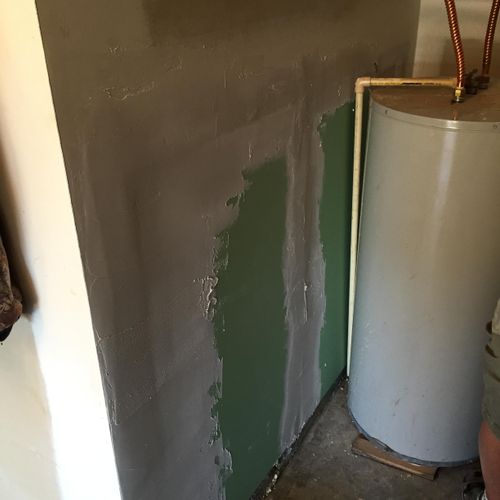 new water heater  and wall repair