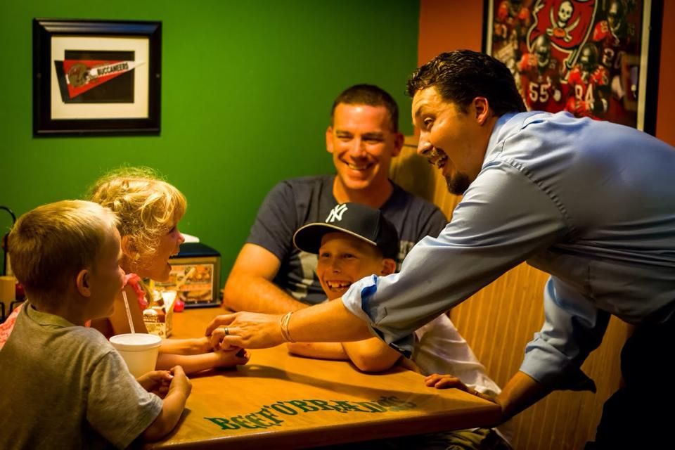 Smiles all around as Frank Davis performs close-up