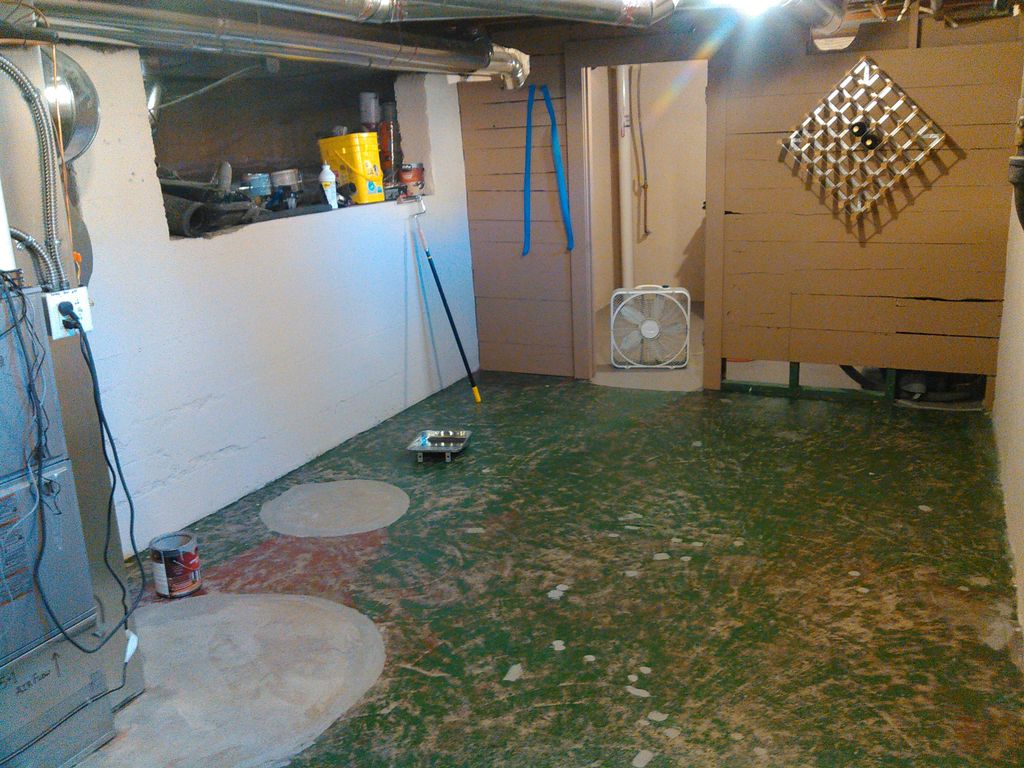 Basement floor, surface roughed by grinder