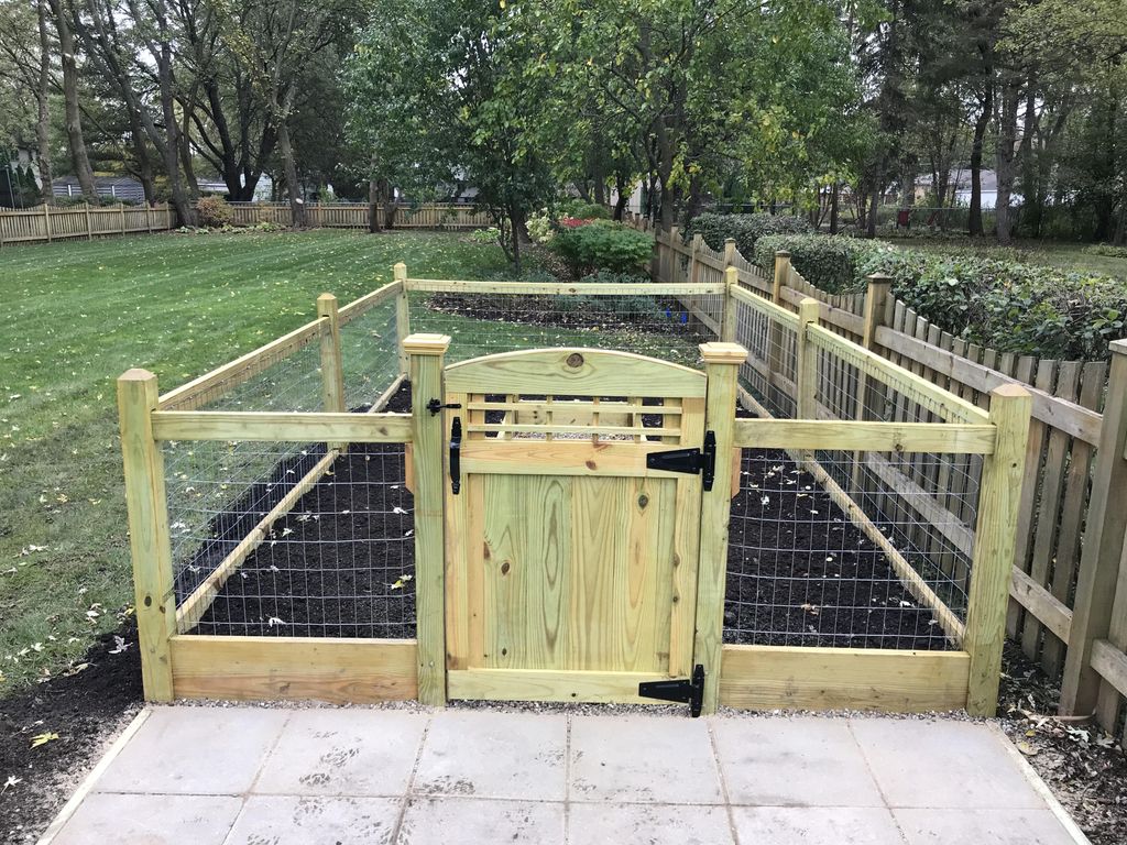 Front 9x16x4 foot tall gated and stone path garden