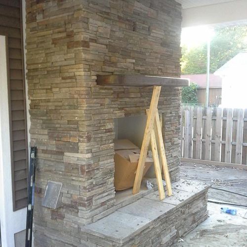 Culture stone, hearth, and mantle to finish off th