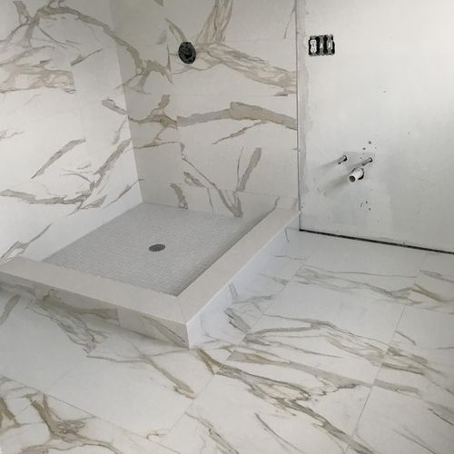 12x36” porcelainosa tile walls and ceiling 30x30” 