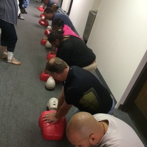 Teaching Adult CPR to workers at a body shop compa
