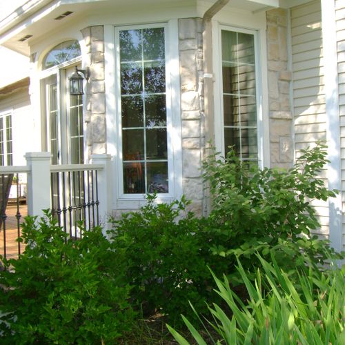 Stone, trim, gutters, and window/door installation