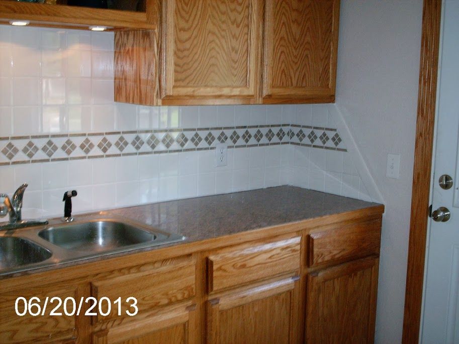 Tile , formica & under cabinet lighting .