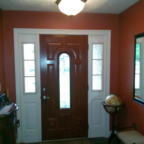 Installation of entry door and painting of foyer