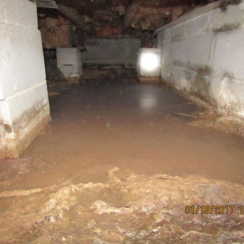 Standing water in crawlspace.