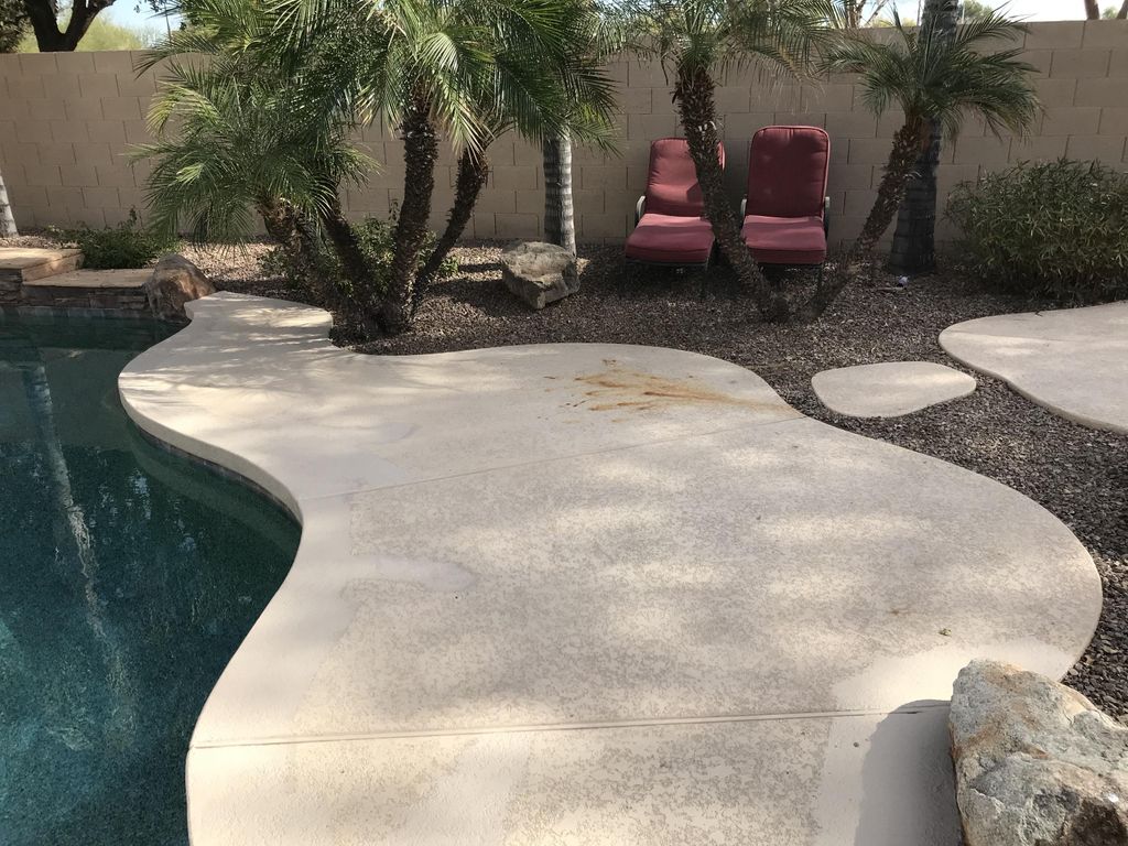 Old faded cool deck with numerous stains 