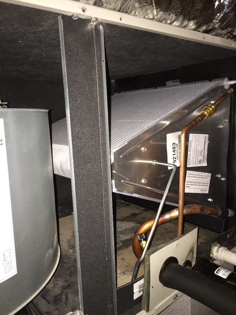A/C indoor evaporator coil installation.