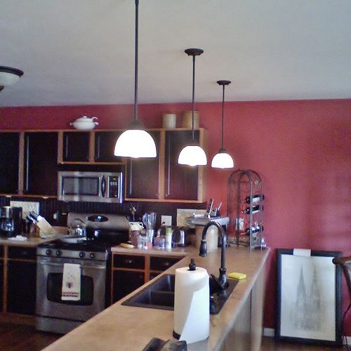 Kitchen pendant lighting installed via attic fed b