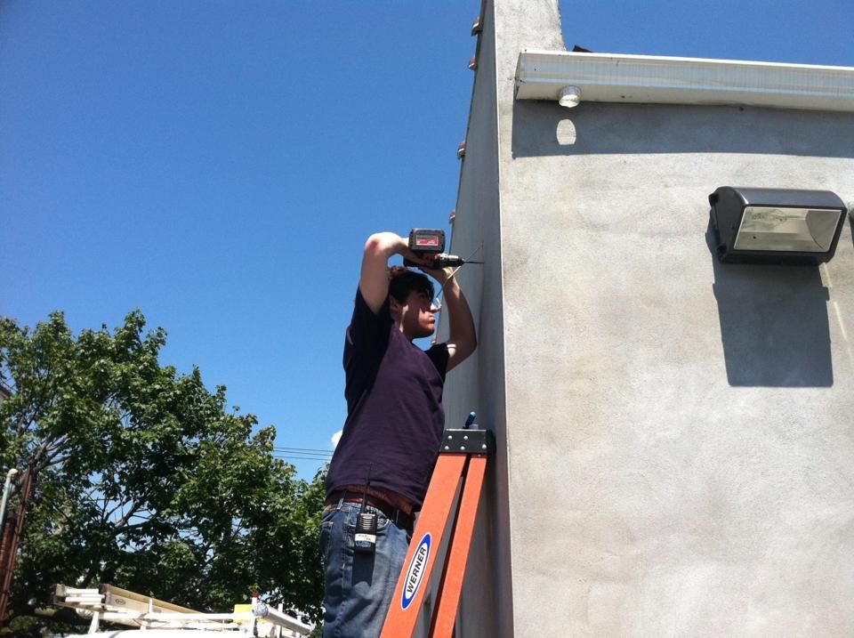 Me, installing some IP surveillance cameras.