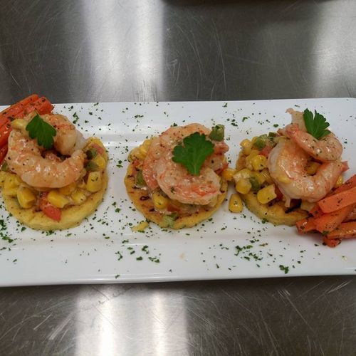 Appetizer of Shrimp on Polenta Cakes with a Fresh 