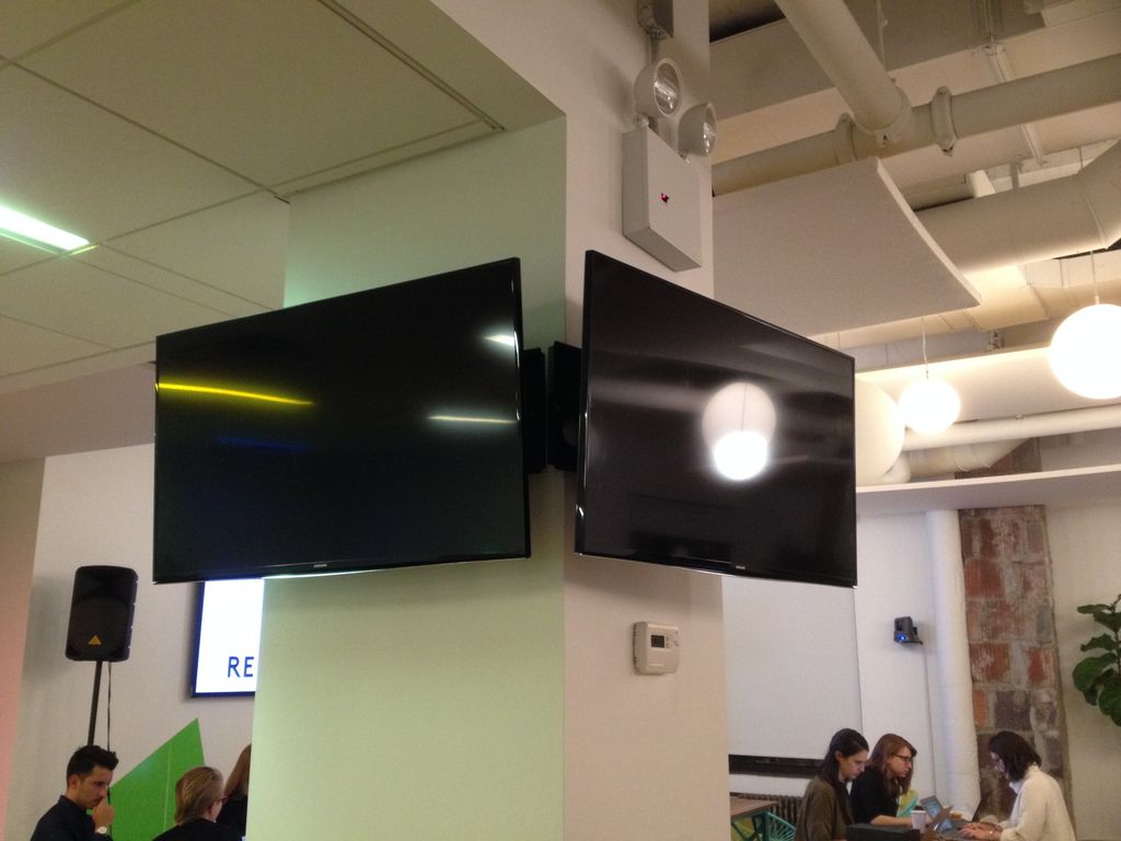 Multiple TVs installed for office conference space