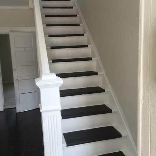 Painted the stairs and installed stair treads 