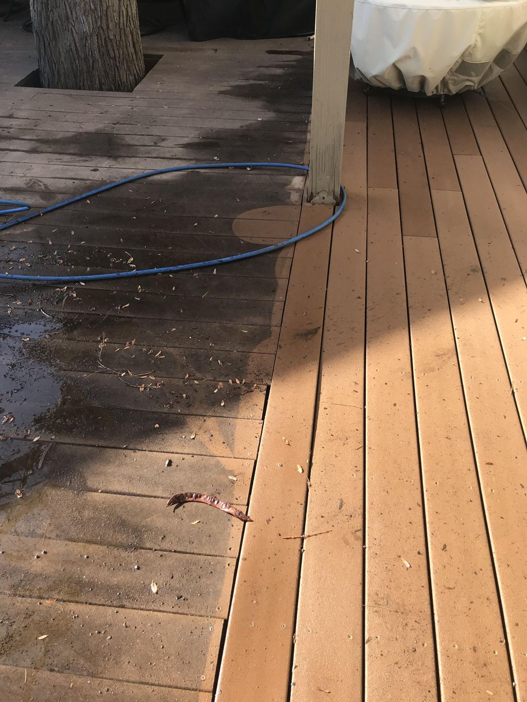 Before left - after right - pressure washing deck 