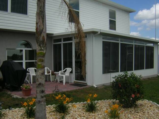 Glass enclosure built on back of Florida Home. Bri