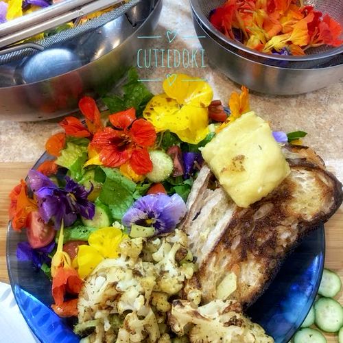 Edible Flower salad with roasted cauliflower and g