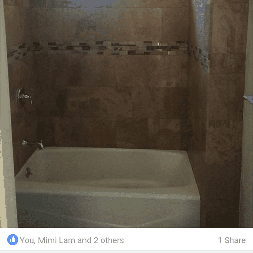 Travertine tub/shower in Laguna Beach 