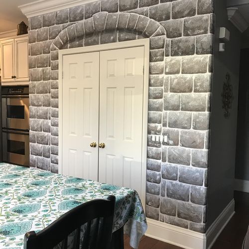"Stone" painted onto blank wall in kitchen surroun