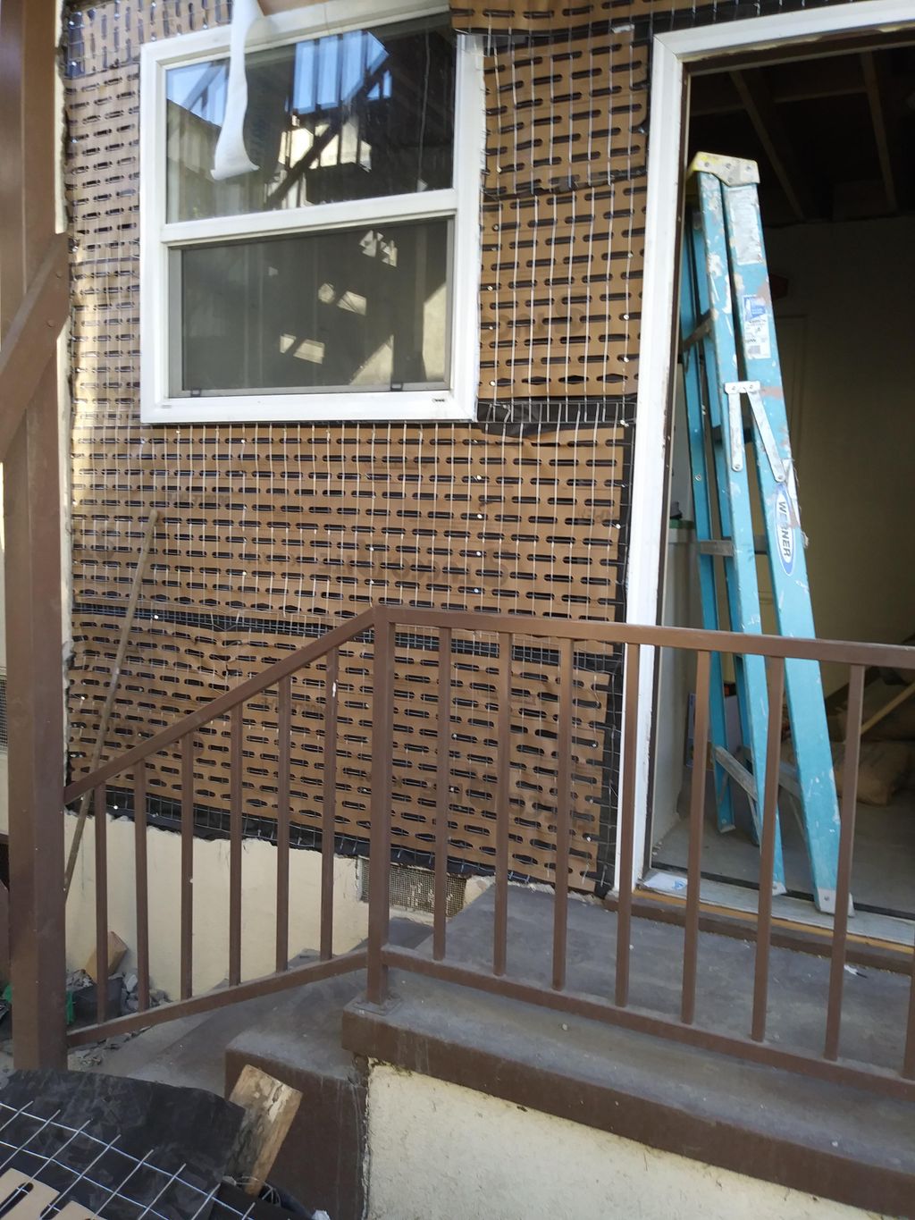 install window stucco paper ready for stucco