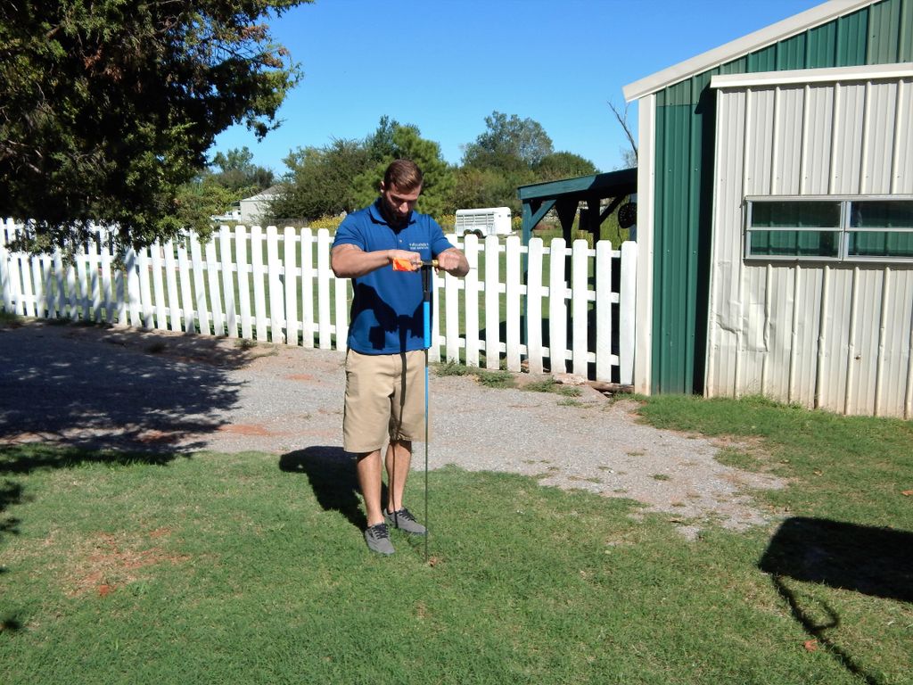 Inspector Brian D. preparing to locate the septic 