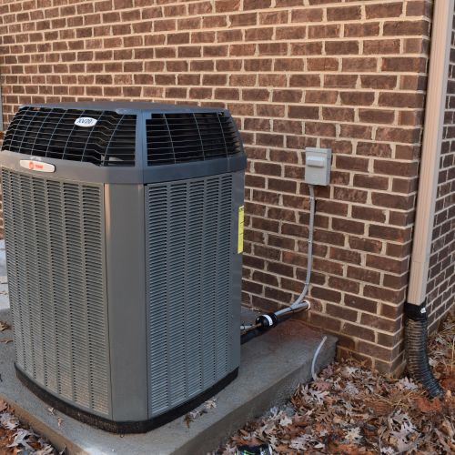 This photo is of a Trane outdoor heat pump unit we