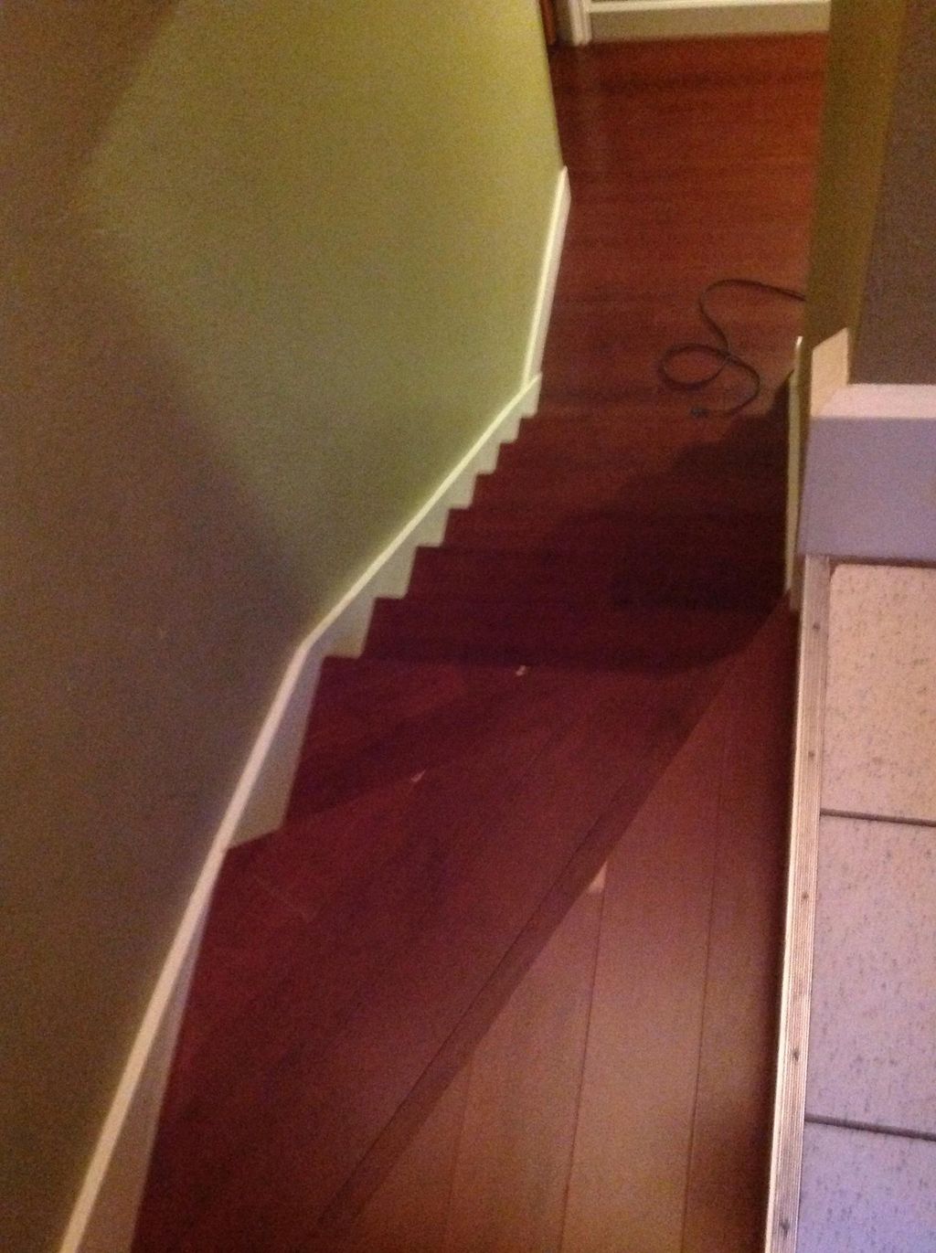 Stairway refinished. Originally a worn gray linole