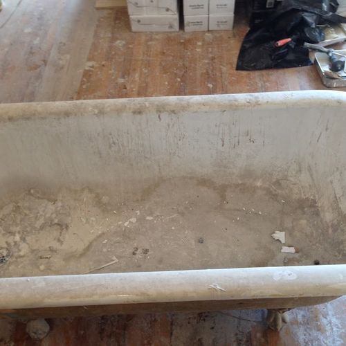 this beautiful antique claw foot  bathtub with eag