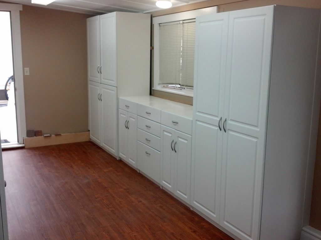 Floor replacement, and cabinet installation.