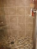 Bathroom remodel with tile walls and floor with bu