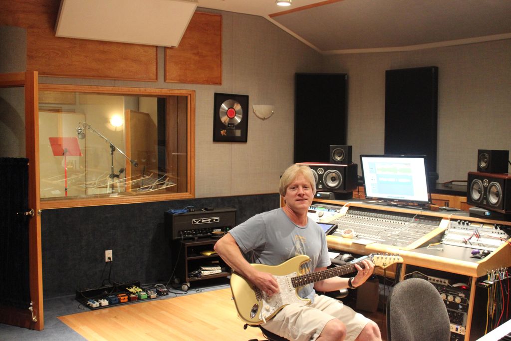 Dave Chamberlin laying down guitar tracks.