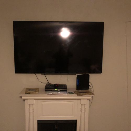 65” TV wall mounted client decided not to have wir