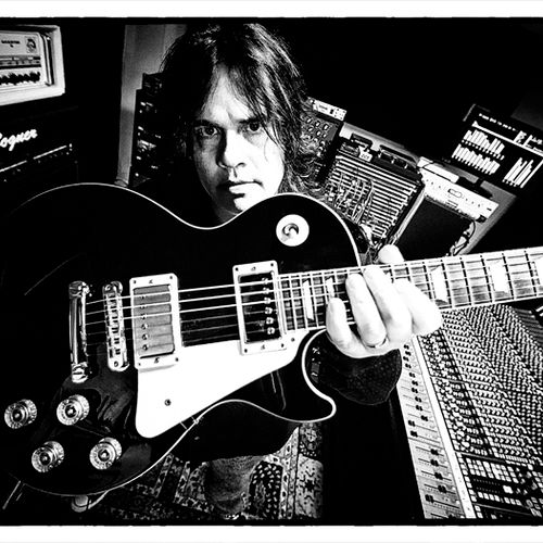 James with his favorite Gibson Les Paul at his stu