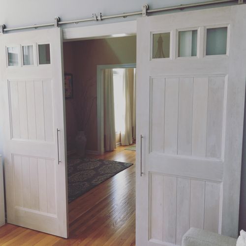 Bespoke interior barn doors made from maple with a