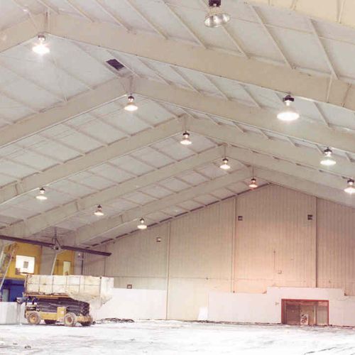 Insulating and sealing with foam in plane hangar f