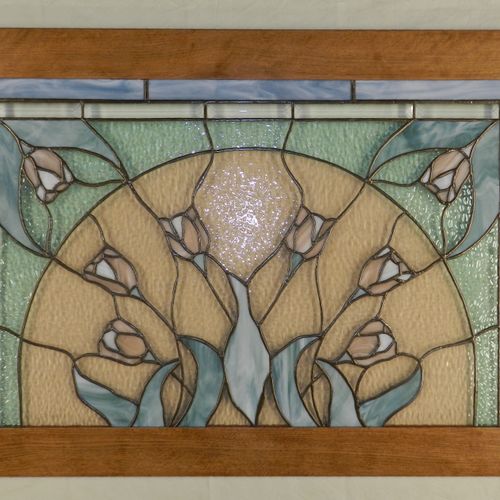 Reset an antique stained glass panel into a staine