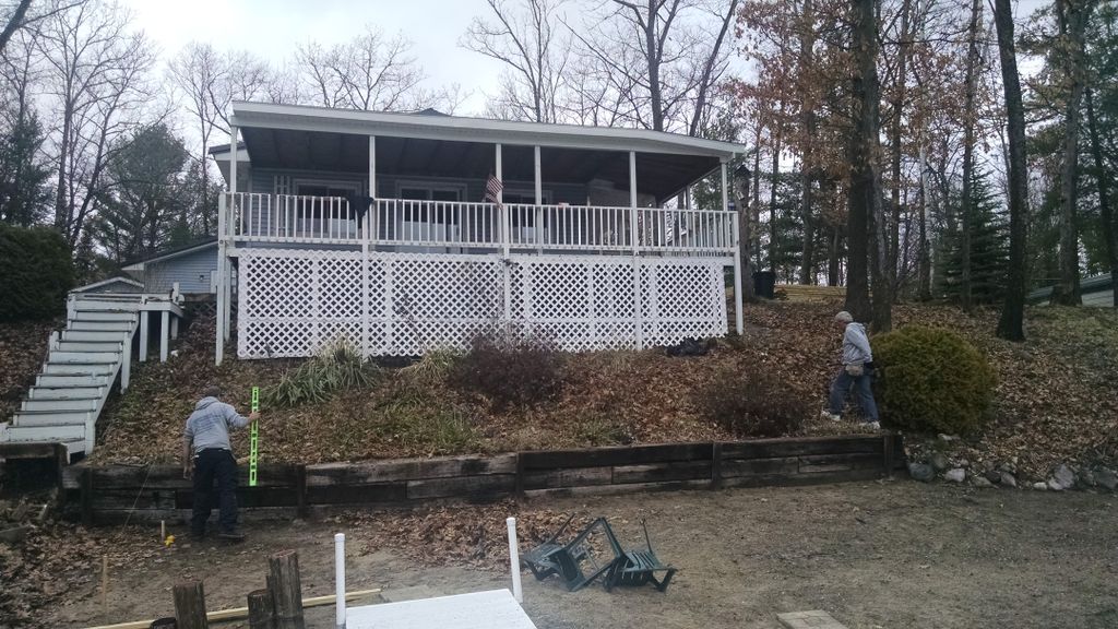 Before picture of lakefront deck in Harrison, MI.