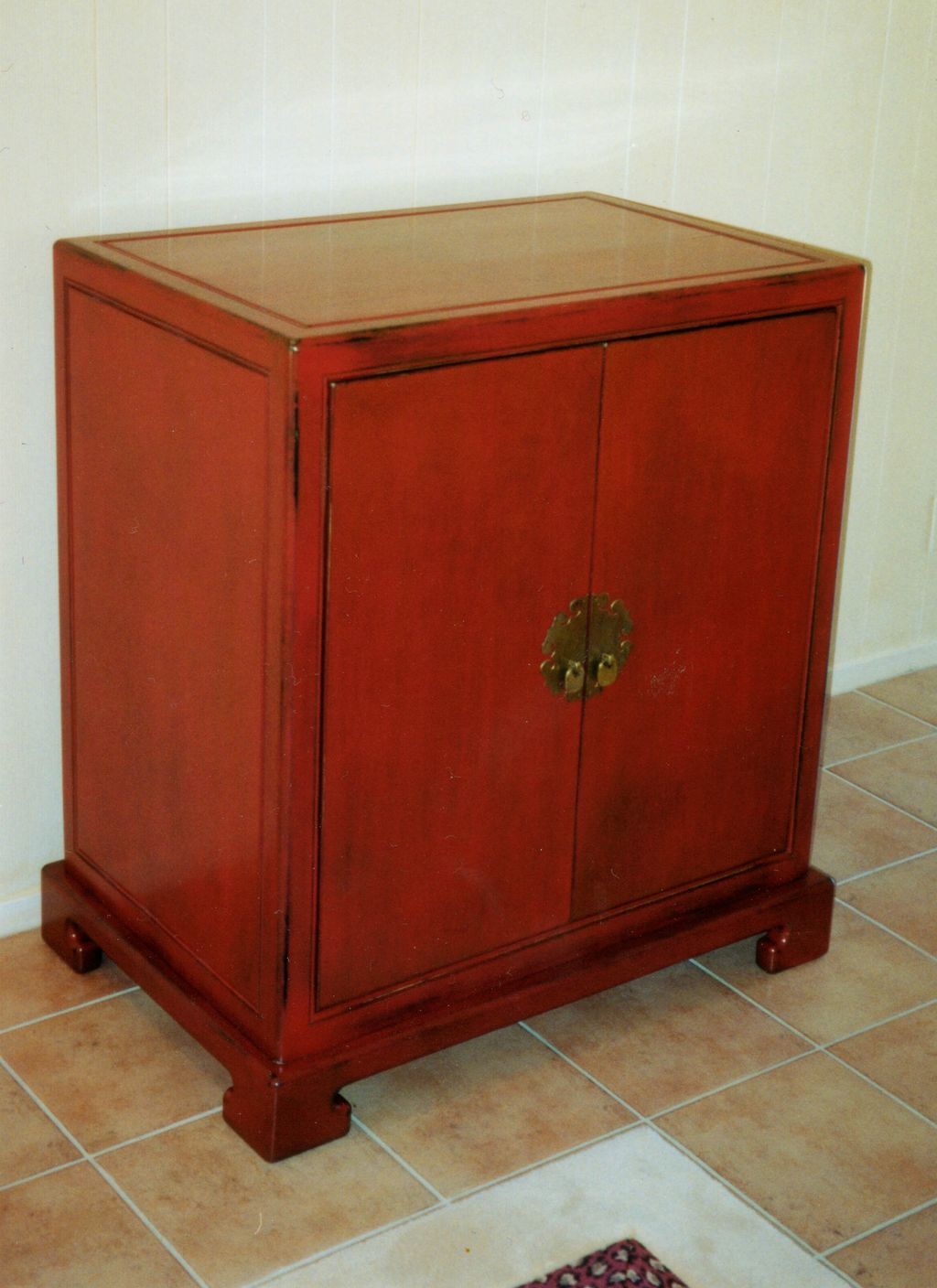 New cabinet painted to look like a Chinese red lac