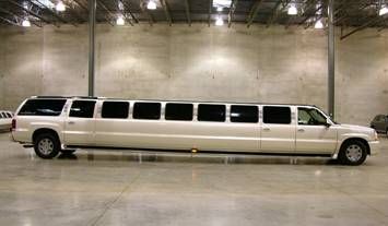 23 Passenger Escalade with 5th door allows for eas