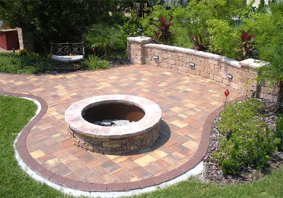 We built the patio, wall, fire pit and landscaping