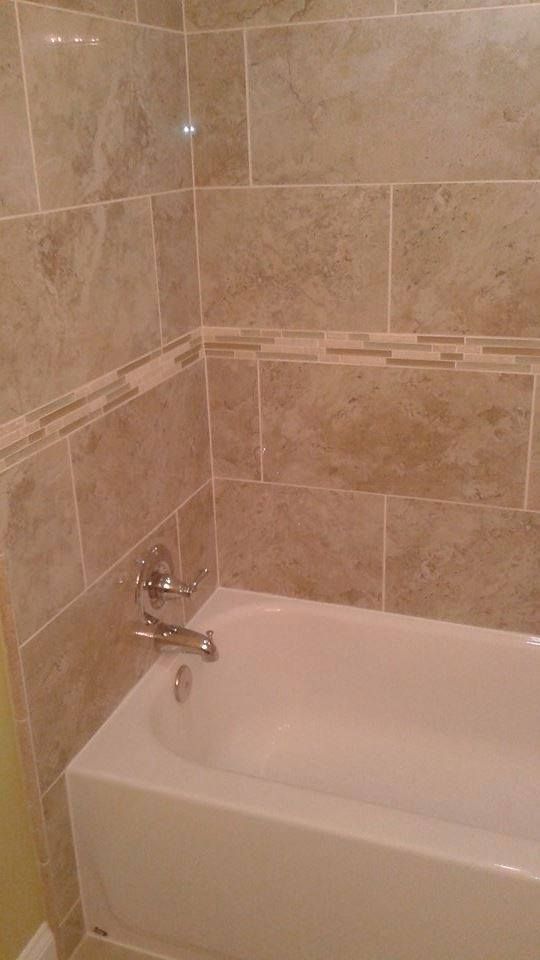 New tub wall tile.