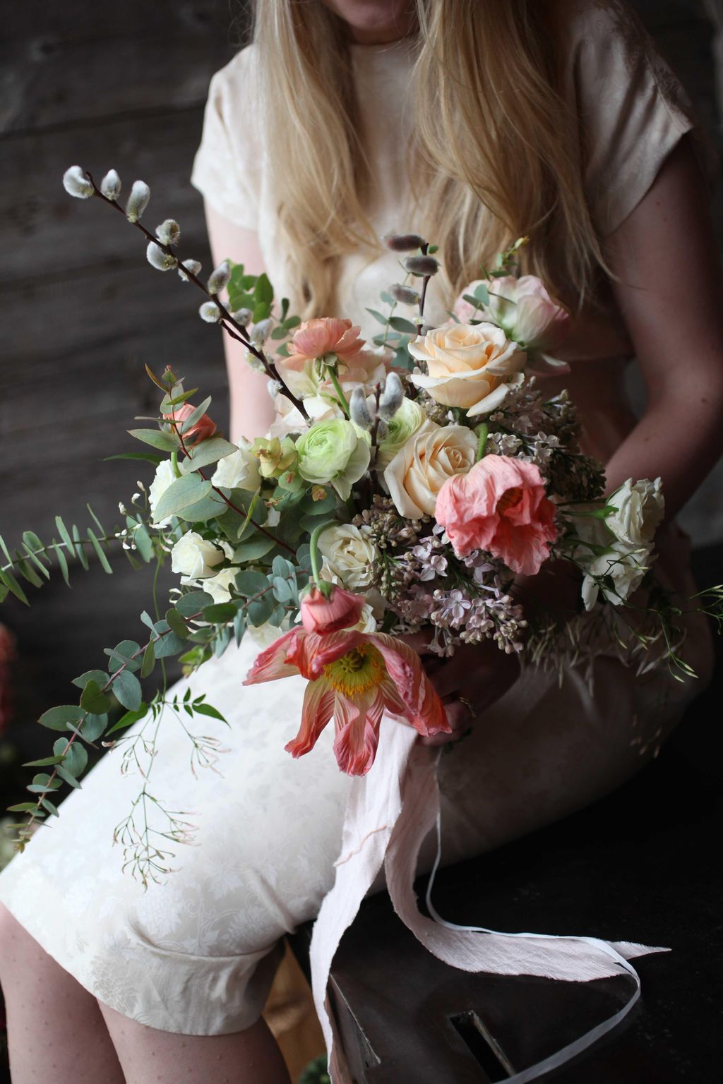 Spring wedding bouquet with California Poppies and