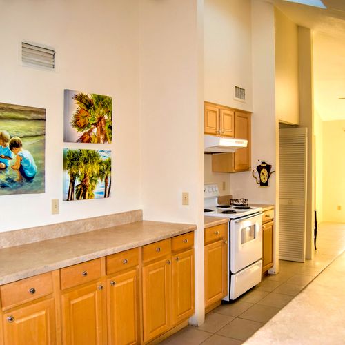 Galley kitchens can become fun with great artwork!